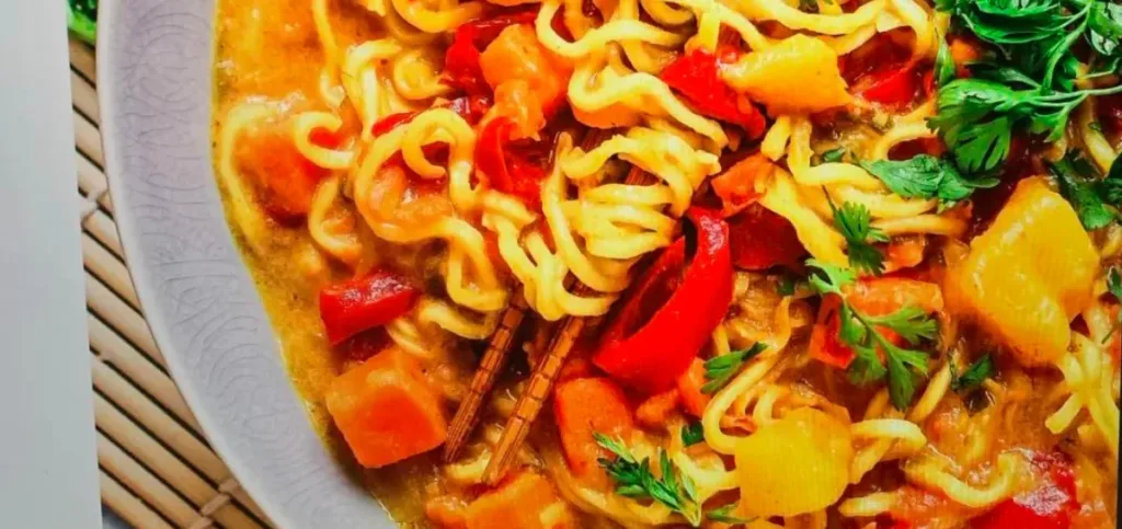 Mango Curry Noodles With Coconut Flakes