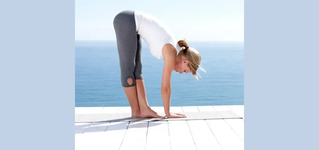 Standing Forward Bend with Crossed Legs
